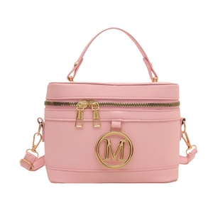 Sac seau rose en cuir synthétique avec logo M doré et bandoulière amovible