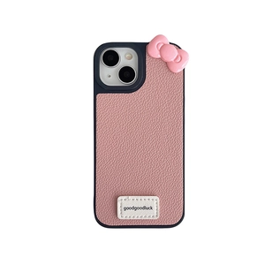 Pink lychee leather iPhone case with blue bumper and cute 3D bow decoration