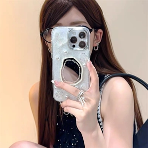 Detail of iPhone case with 3D butterflies, pearls, flowers and built-in vanity mirror