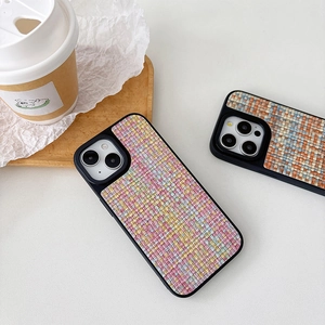 Close-up of woven texture phone cases for iPhone in pastel colors and stylish design
