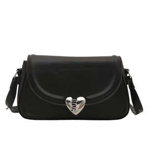 Minimalist black square underarm bag with silver heart buckle on white background