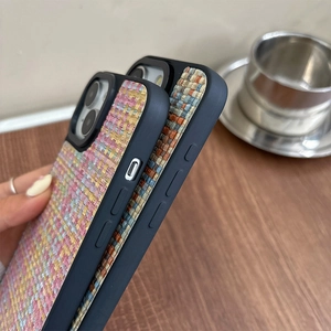 Detailed view of woven fabric texture on blue iPhone 17 Pro Max luxury phone case