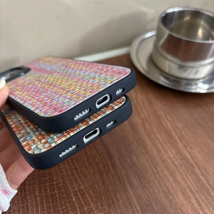 Detail of woven leather texture phone case with precise bottom port cutouts