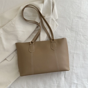 Minimalist khaki leather tote bag with white contrast stitching and large capacity