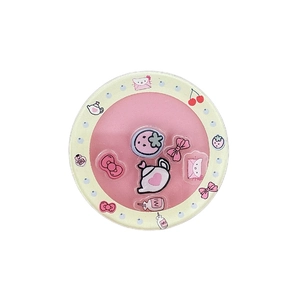 Pink heart shaker phone socket with floating strawberry, bow, and teapot charms inside