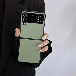 Detail of light green litchi texture leather case for Samsung Z Flip foldable phone