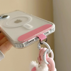 Detail of pink woven phone lanyard with metal clasp and MagSafe compatible case
