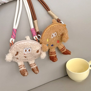 Close-up of cute cartoon plush biscuit purses with colorful braided crossbody straps