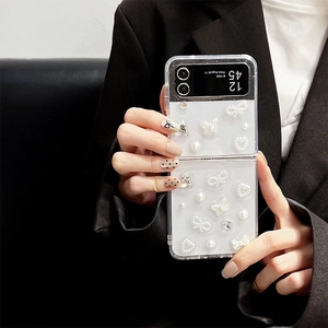 Elegant clear case for Samsung Z Flip 5 with 3D pearl bow and butterfly decorations