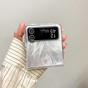 Macro shot of clear folding phone case on silver metal finish with precision cutouts