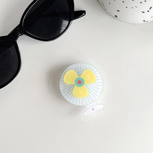 Detail of a rotating fan-shaped phone grip with yellow and blue acrylic finish