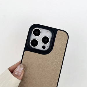 Close-up of luxury khaki lychee leather phone case with raised camera protective lens ring