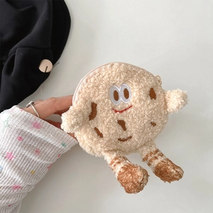 Close-up of cute plush biscuit coin purse with soft texture and cartoon character face