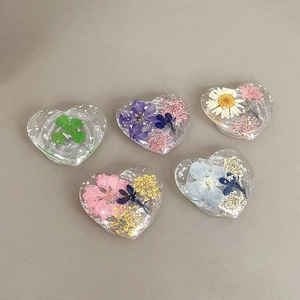 Heart-shaped resin phone sockets with pressed real dried flowers and silver foil flakes