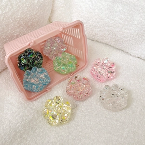 Translucent glitter cat paw phone grip set in multiple iridescent colors with sequins