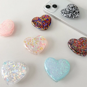Transparent heart phone socket with glitter and sequins for expandable desktop stand