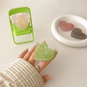 Sparkly glitter heart-shaped expanding phone grip stand for mobile devices