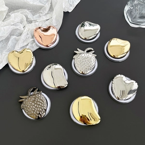 Metallic heart and strawberry magnetic phone grip stands in various electroplated finishes