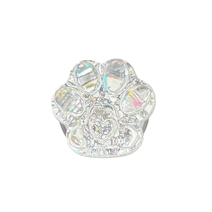 Transparent cat paw phone grip with colorful sequins and heart detail on white base