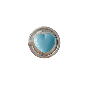 Polished silver magnetic heart phone ring holder with a soft blue glazed inlay design