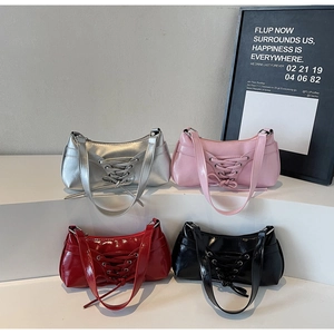 French style baguette bags in silver, pink, red, and black with bow strap details