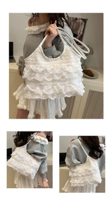 Close-up of white lace layered ruffles and textured fabric handle on casual tote bag