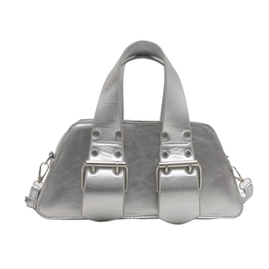 Metallic silver handbag with large buckles and dual handles for shoulder and crossbody use