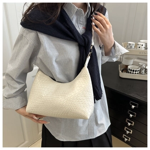 Chic white woven hobo bag for women stylish everyday commuter shoulder bag detail view