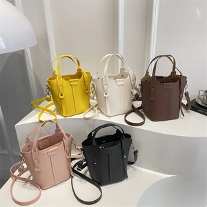 Fashionable textured lychee pattern bucket bag set in five colors with adjustable strap