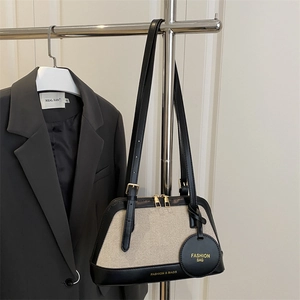Retro canvas and leather shell bag with gold fashion lettering and adjustable strap