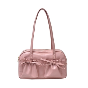Pink vintage bowling bag with decorative leather bows and double front pockets