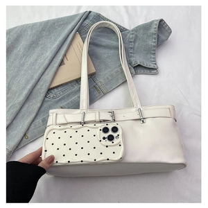 Minimalist white PU leather underarm bag with decorative buckle and polka dot phone case