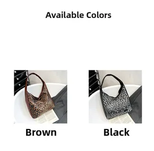 Detail view of leopard print tote bags in brown and black patterns with large capacity