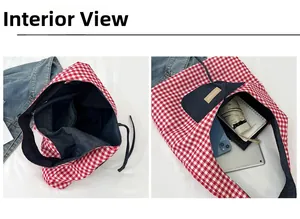 Internal view of red plaid tote bag showing denim lining and large storage capacity