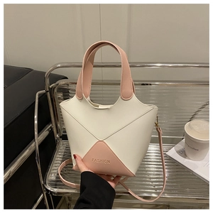 Sac seau chic en cuir PU bicolore blanc et rose avec poignée et bandoulière réglable
