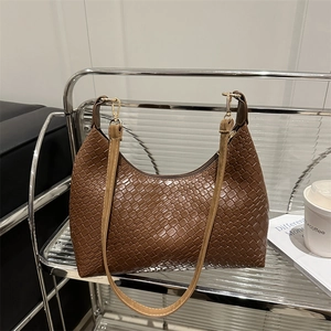 Elegant brown woven PU leather hobo bag with slim beige strap for stylish daily commute.