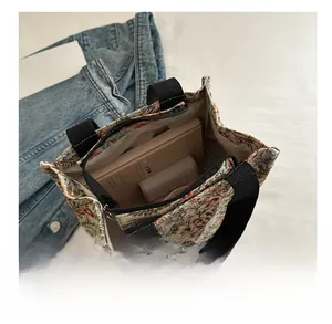 Internal view of floral tote bag showing spacious capacity for books and essentials