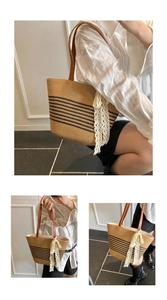 Detailed close-up of straw woven tote bag featuring brown leather handles and lace ribbon