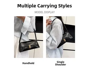 Detailed comparison of the black rectangular baguette bag worn as a handbag and shoulder bag