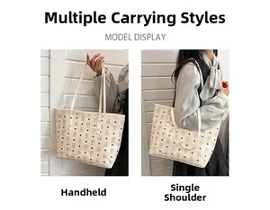 Detail showing two carrying styles of the cream tote bag: handheld and shoulder carry