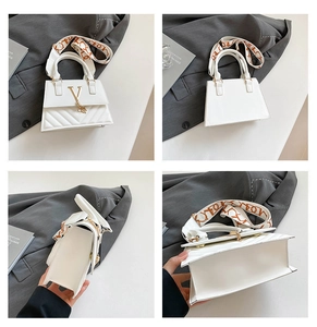 Four-angle view of a white structured tote bag with gold V-logo and jacquard strap