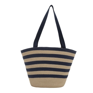 Striped raffia tote bag with navy handles for summer beach and vacation wear