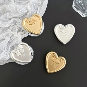 Magnetic metal heart phone grip with 3D bow and Happy engraving in gold and silver