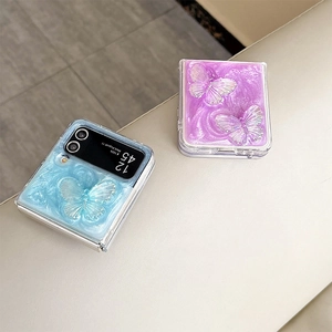 Detailed view of Samsung Z Flip 6 case with glitter glue and 3D bow design in blue and purple