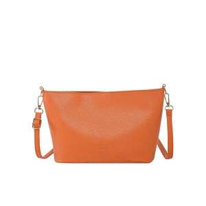 Orange lychee leather bucket bag with adjustable strap and minimalist gold metal hardware