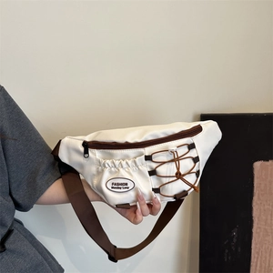 Retro canvas crossbody chest bag in white and brown with elastic cord and embroidery