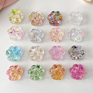 Colorful glitter cat paw retractable phone stands in 16 assorted sparkling colors