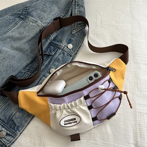 Retro color-block crossbody bag with yellow and purple nylon panels and inner compartments