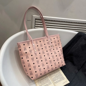 Pink PU leather tote bag with cute bear prints and gold rivet details for daily use