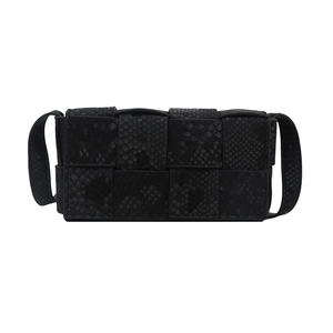Minimalist black woven flap crossbody bag with premium snake skin texture and slim strap